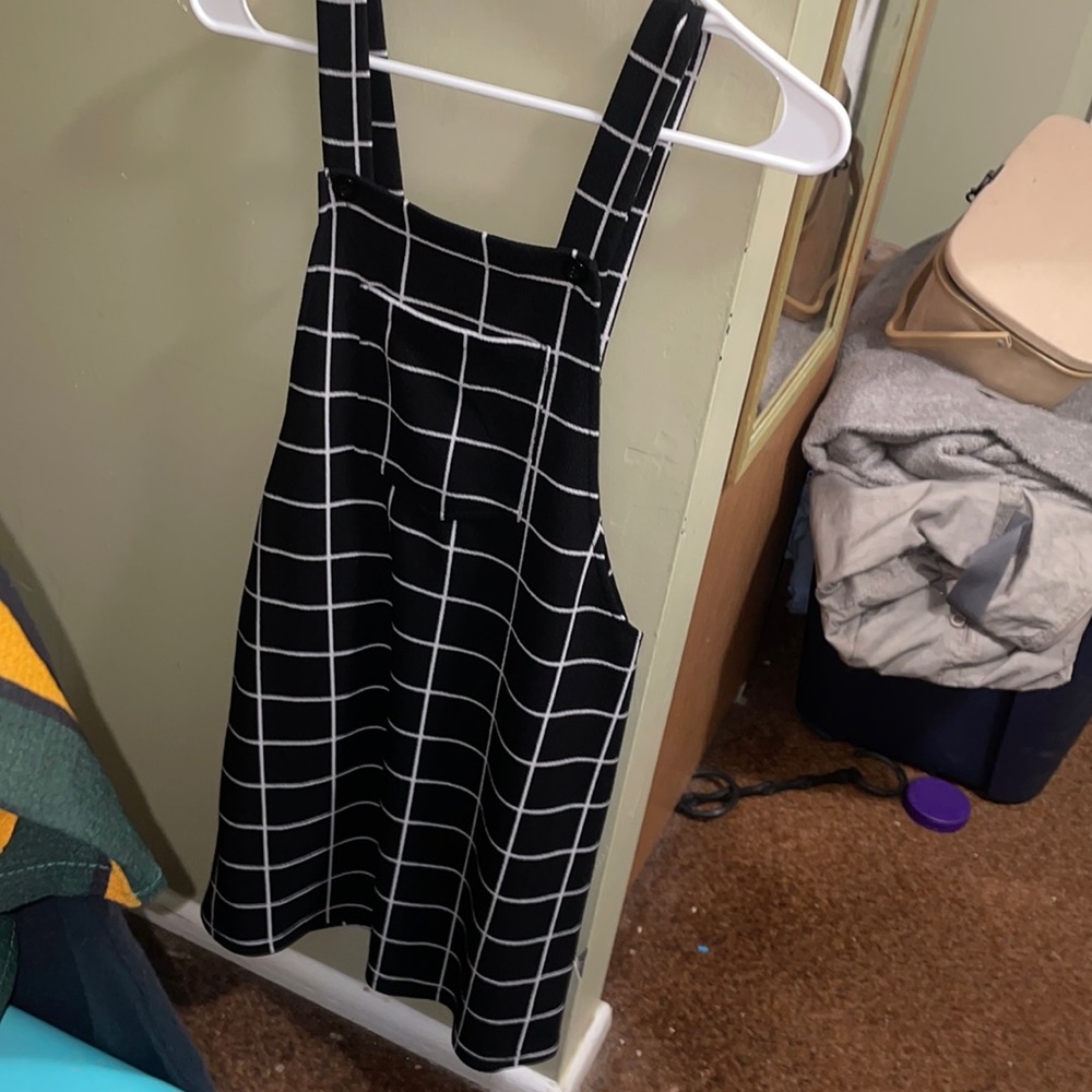 Black and white overall dress with pocket